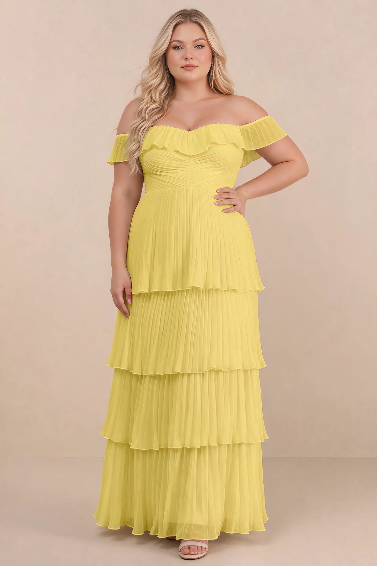 Front view on a second model of Seraphina pastel yellow tiered ruffle maxi dress with a long flowing skirt