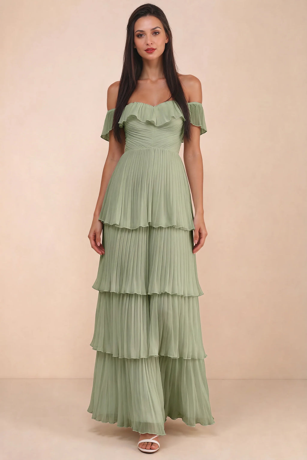 Front studio view of Seraphina pistachio tiered ruffle maxi dress with a long flowing skirt