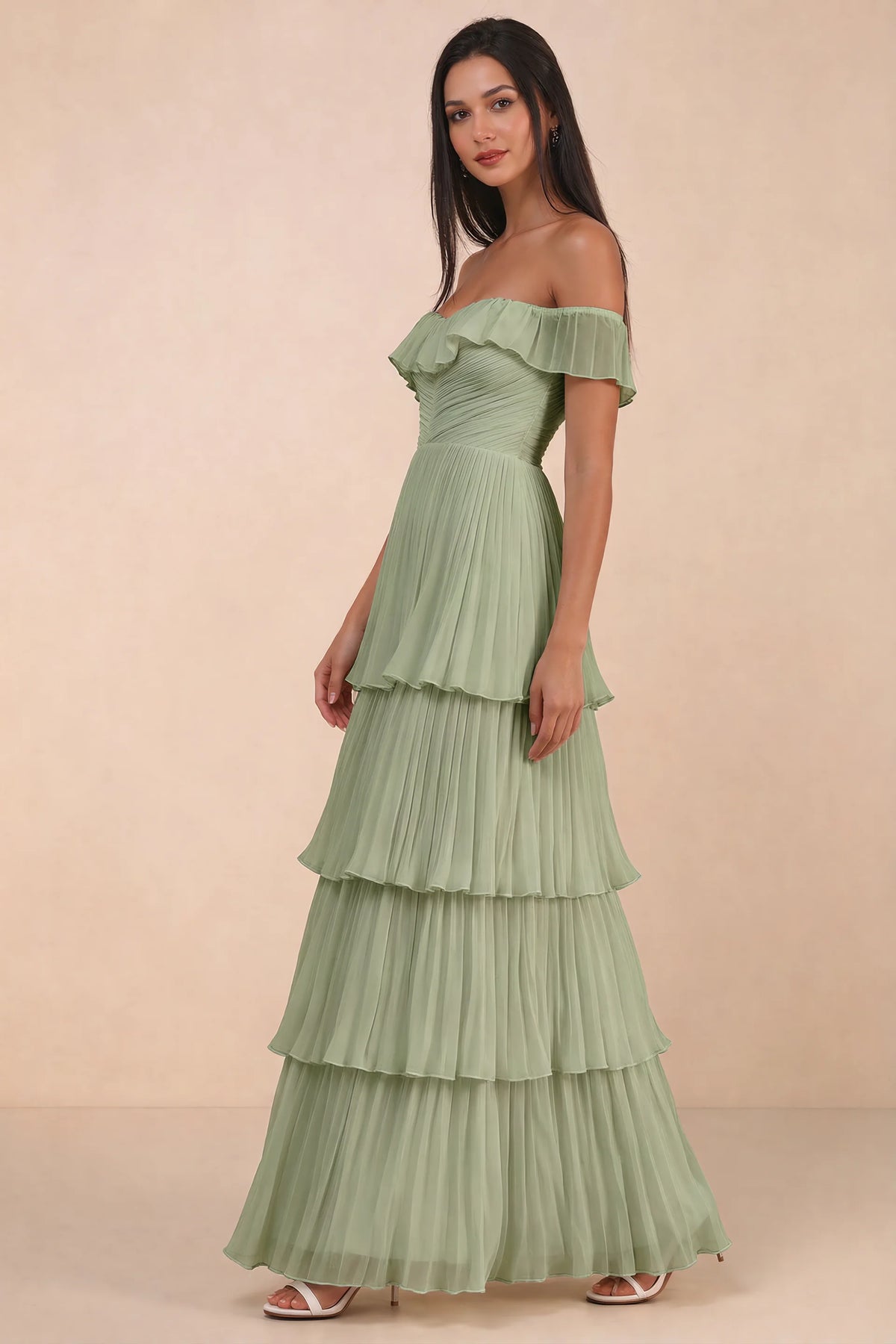 Alternate front studio view of Seraphina pistachio tiered ruffle maxi dress with a long flowing skirt