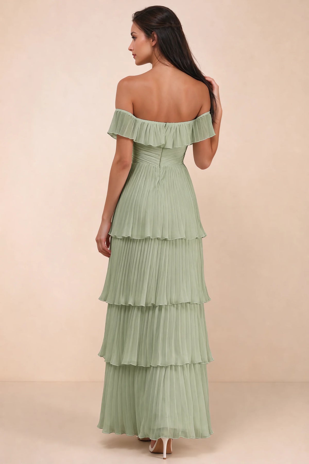 Rear studio view of Seraphina pistachio tiered ruffle maxi dress with a long flowing skirt