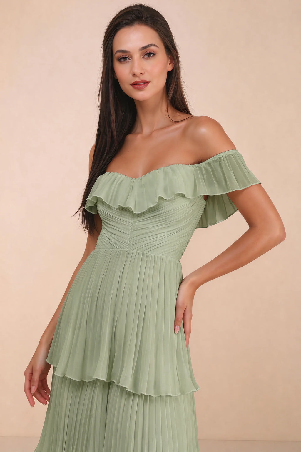 Close-up of shallow sweetheart neckline and off-shoulder ruffle and tiered skirt of Seraphina pistachio tiered ruffle maxi dress