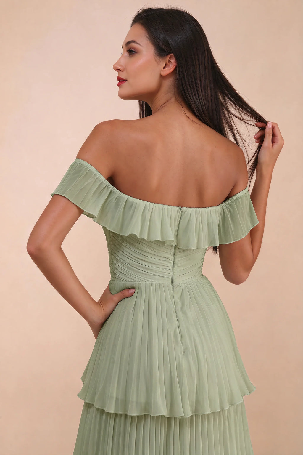 Close-up of back neckline ruffle, ruching and centre-back zipper of Seraphina pistachio tiered ruffle maxi dress