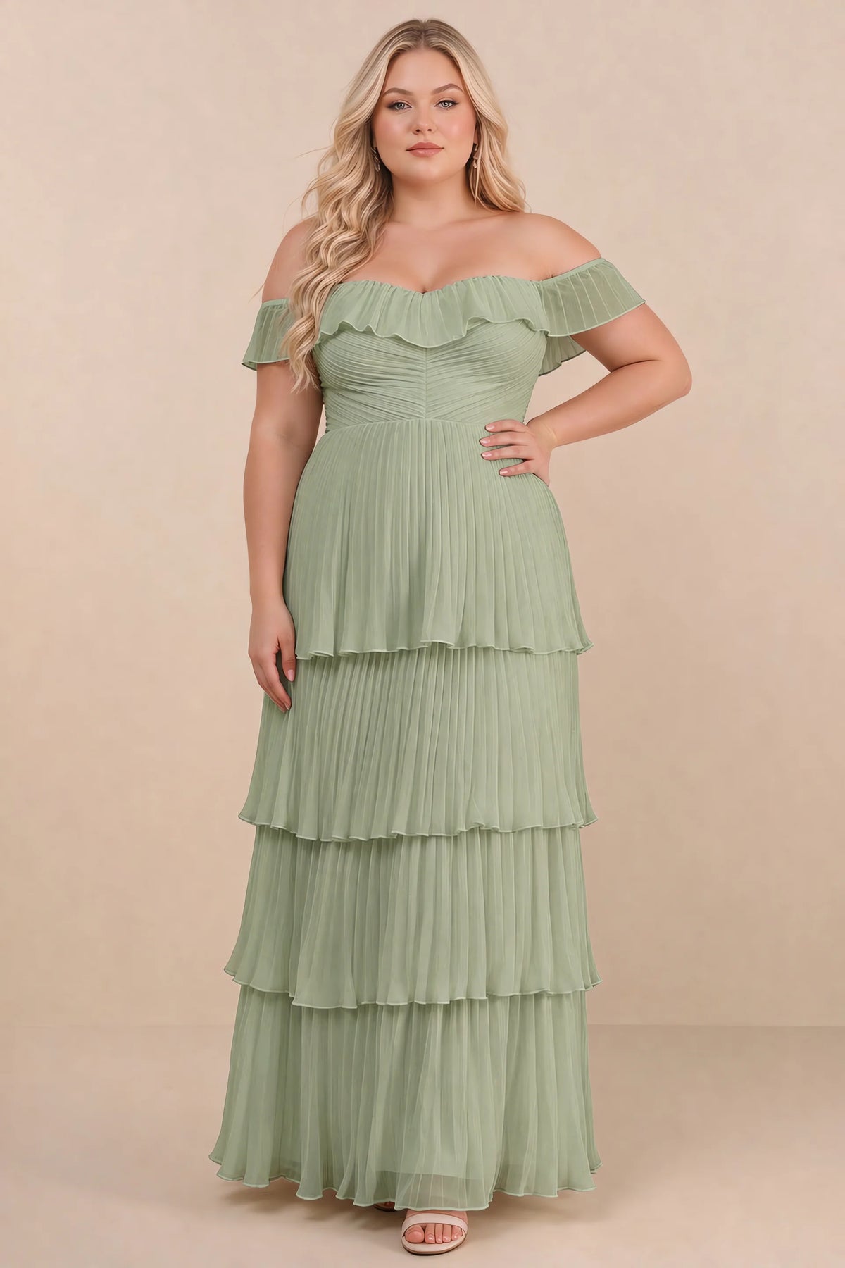 Front view on a second model of Seraphina pistachio tiered ruffle maxi dress with a long flowing skirt
