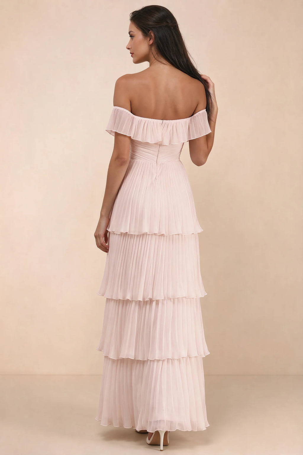 Rear studio view of Seraphina powder pink tiered ruffle maxi dress with a long flowing skirt