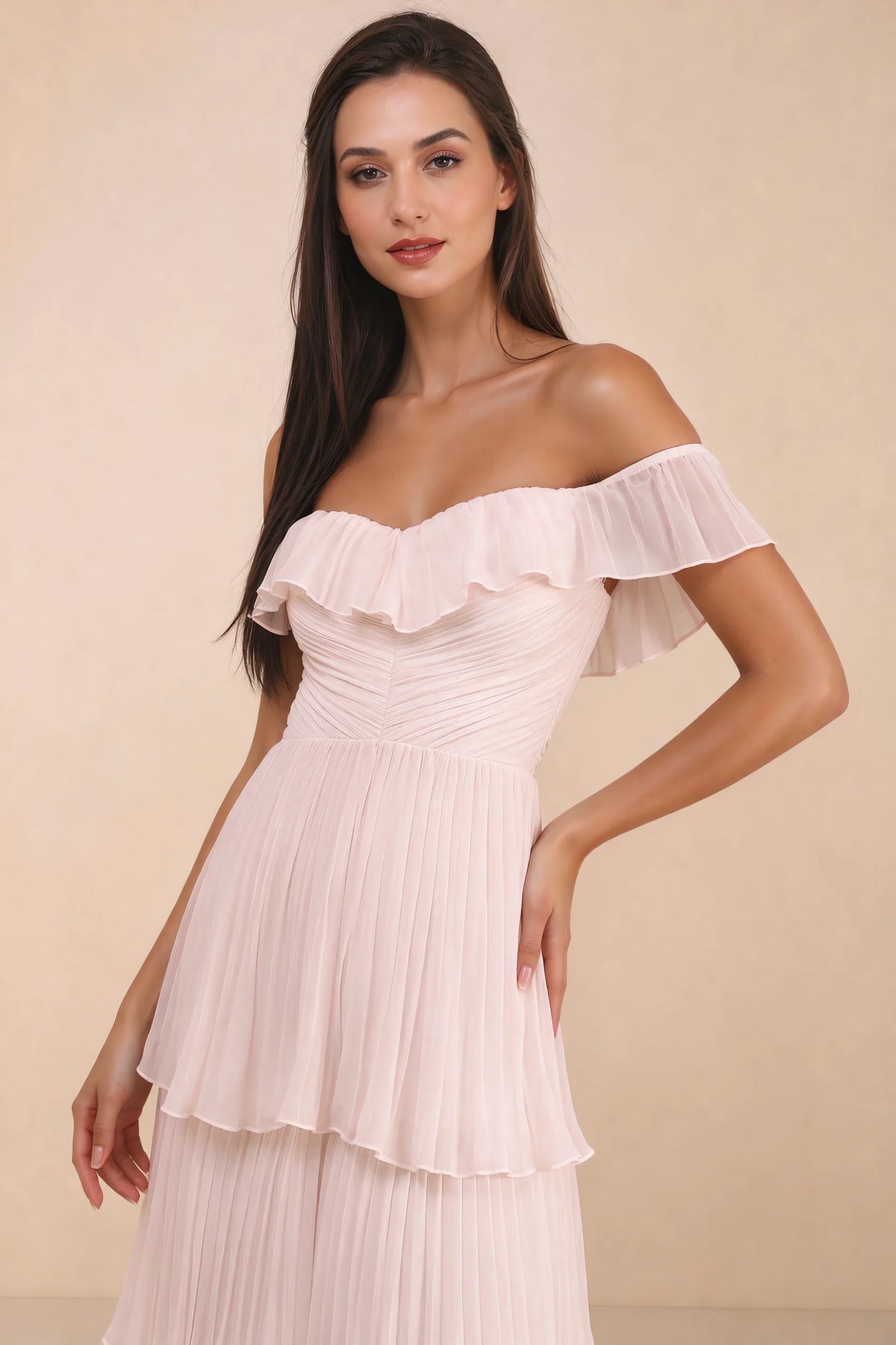 Close-up of shallow sweetheart neckline and off-shoulder ruffle and tiered skirt of Seraphina powder pink tiered ruffle maxi dress