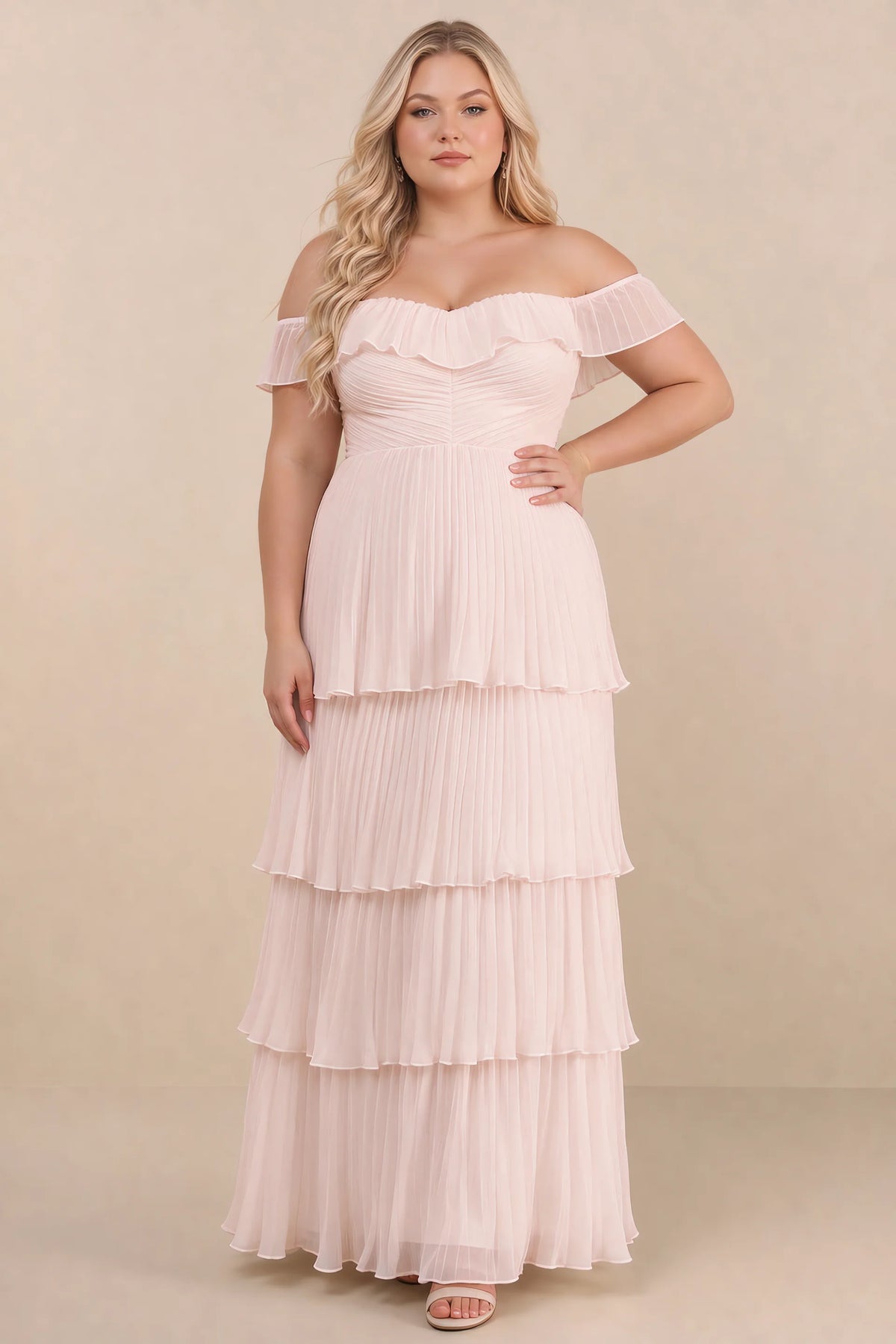 Front view on a second model of Seraphina powder pink tiered ruffle maxi dress with a long flowing skirt