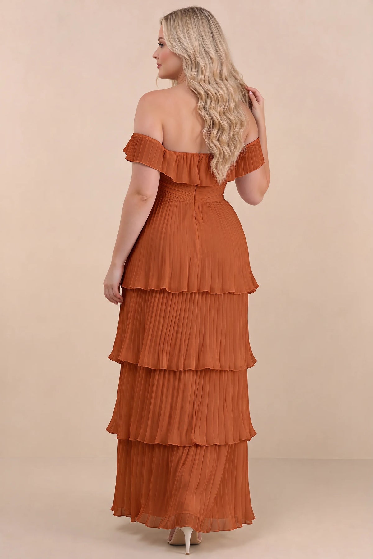 Rear view on a second model of Seraphina rust tiered ruffle maxi dress with a long flowing skirt