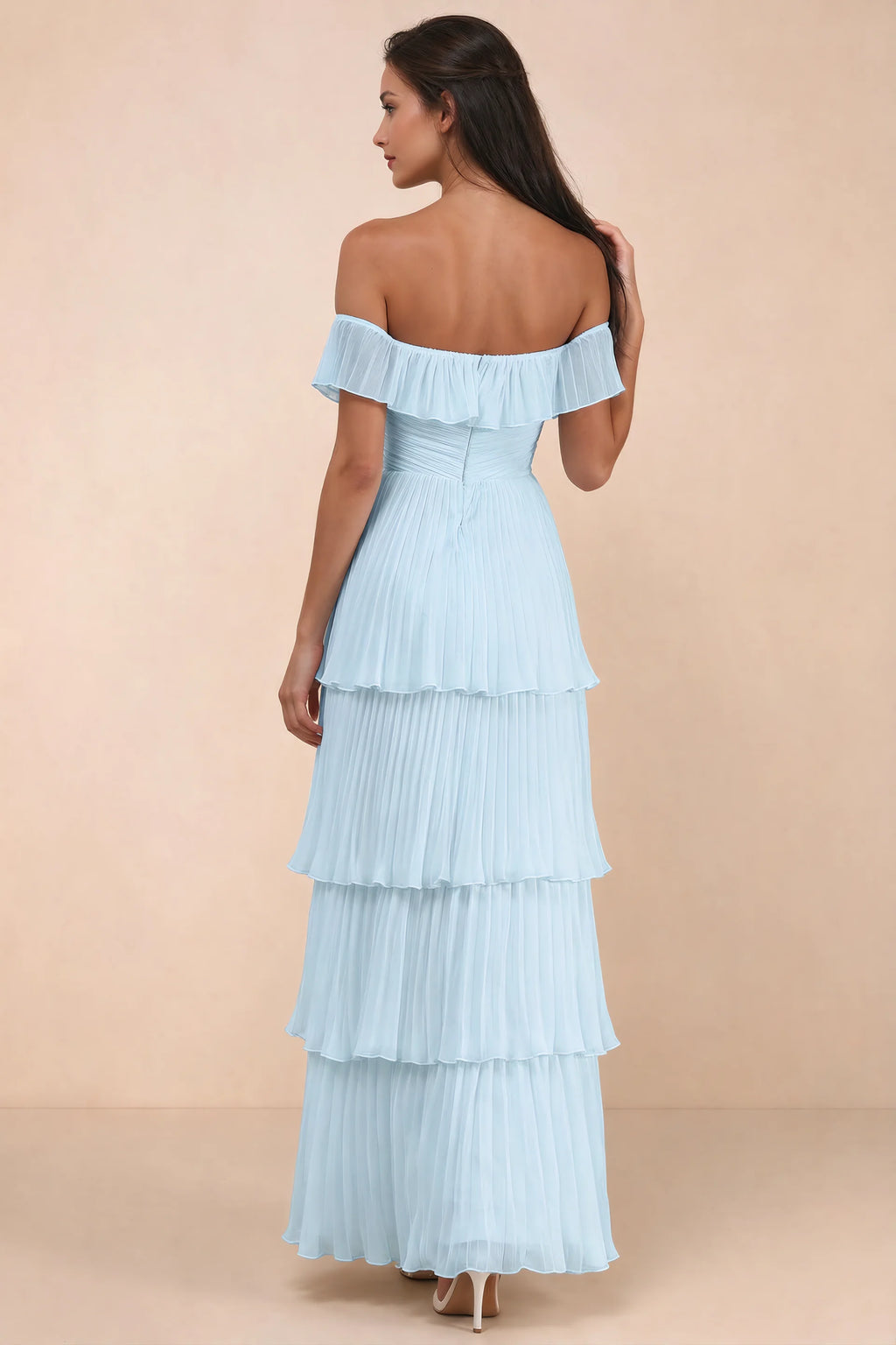 Rear studio view of Seraphina sky blue tiered ruffle maxi dress with a long flowing skirt