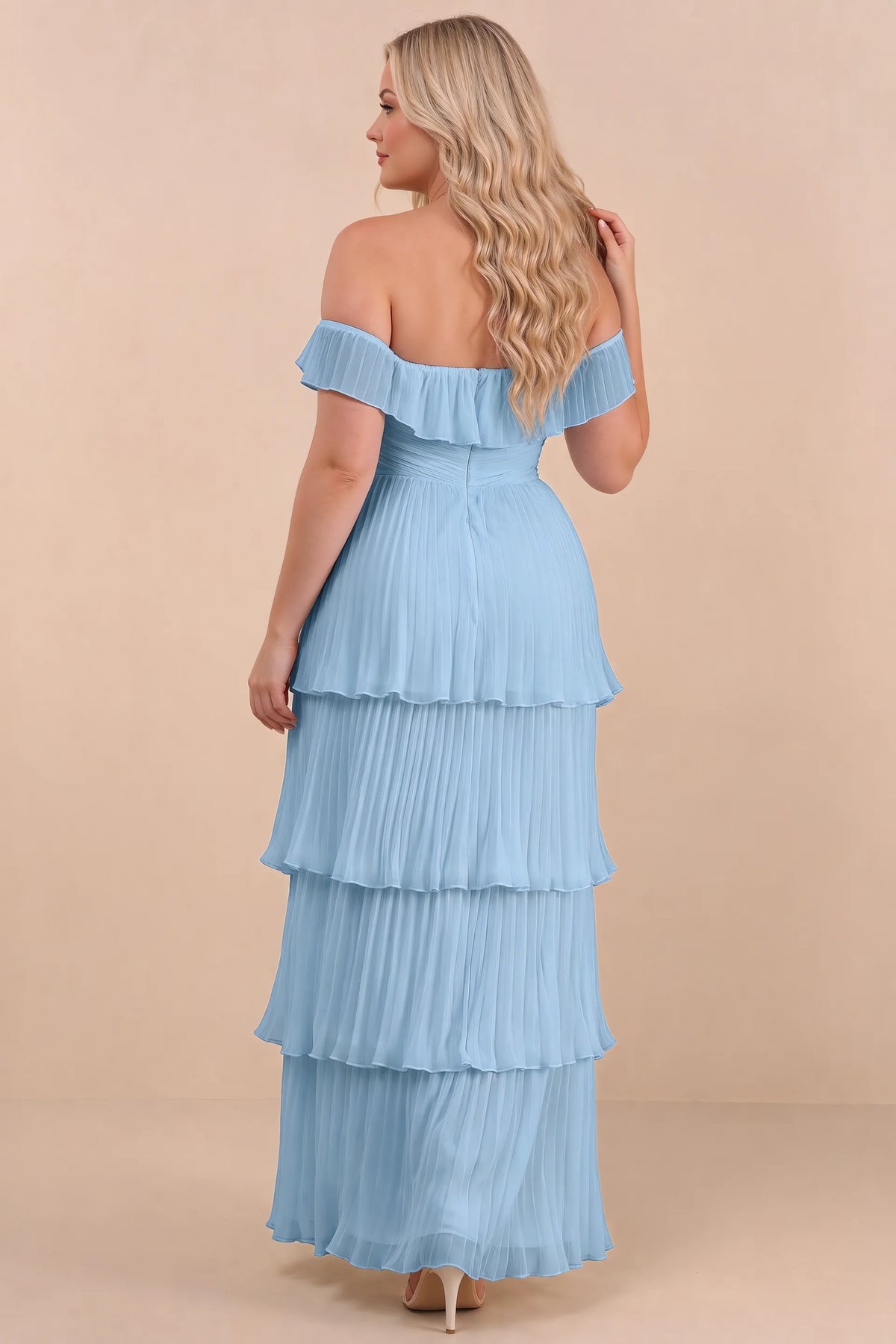 Rear view on a second model of Seraphina steel blue tiered ruffle maxi dress with a long flowing skirt