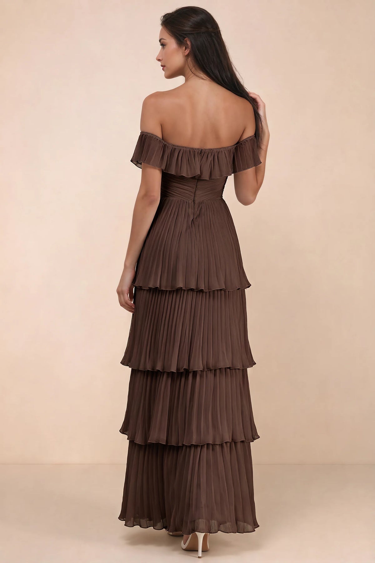 Rear studio view of Seraphina truffle tiered ruffle maxi dress with a long flowing skirt