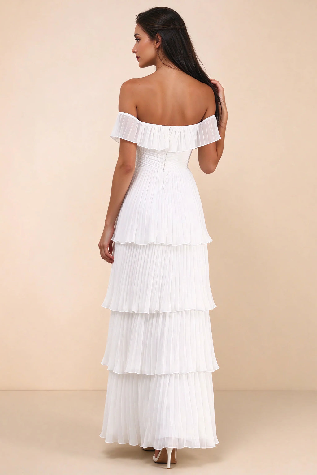 Rear studio view of Seraphina white tiered ruffle maxi dress with a long flowing skirt