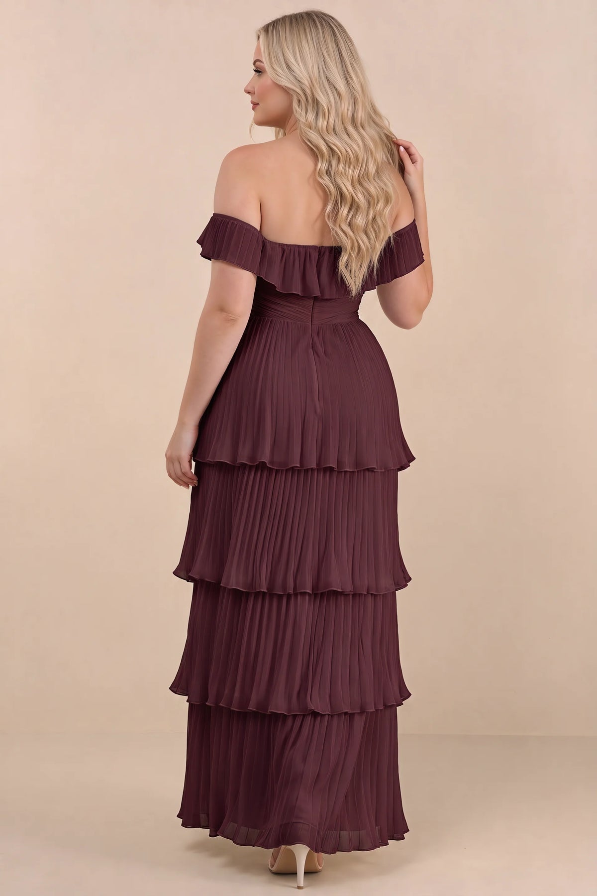 Rear view on a second model of Seraphina wine tiered ruffle maxi dress with a long flowing skirt