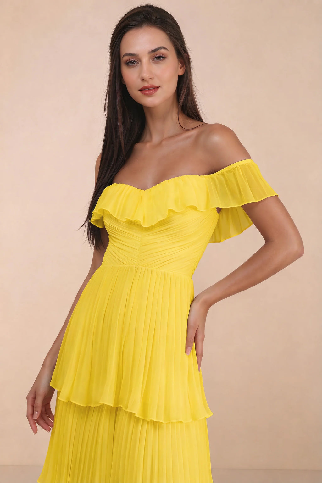 Close-up of shallow sweetheart neckline and off-shoulder ruffle and tiered skirt of Seraphina yellow tiered ruffle maxi dress