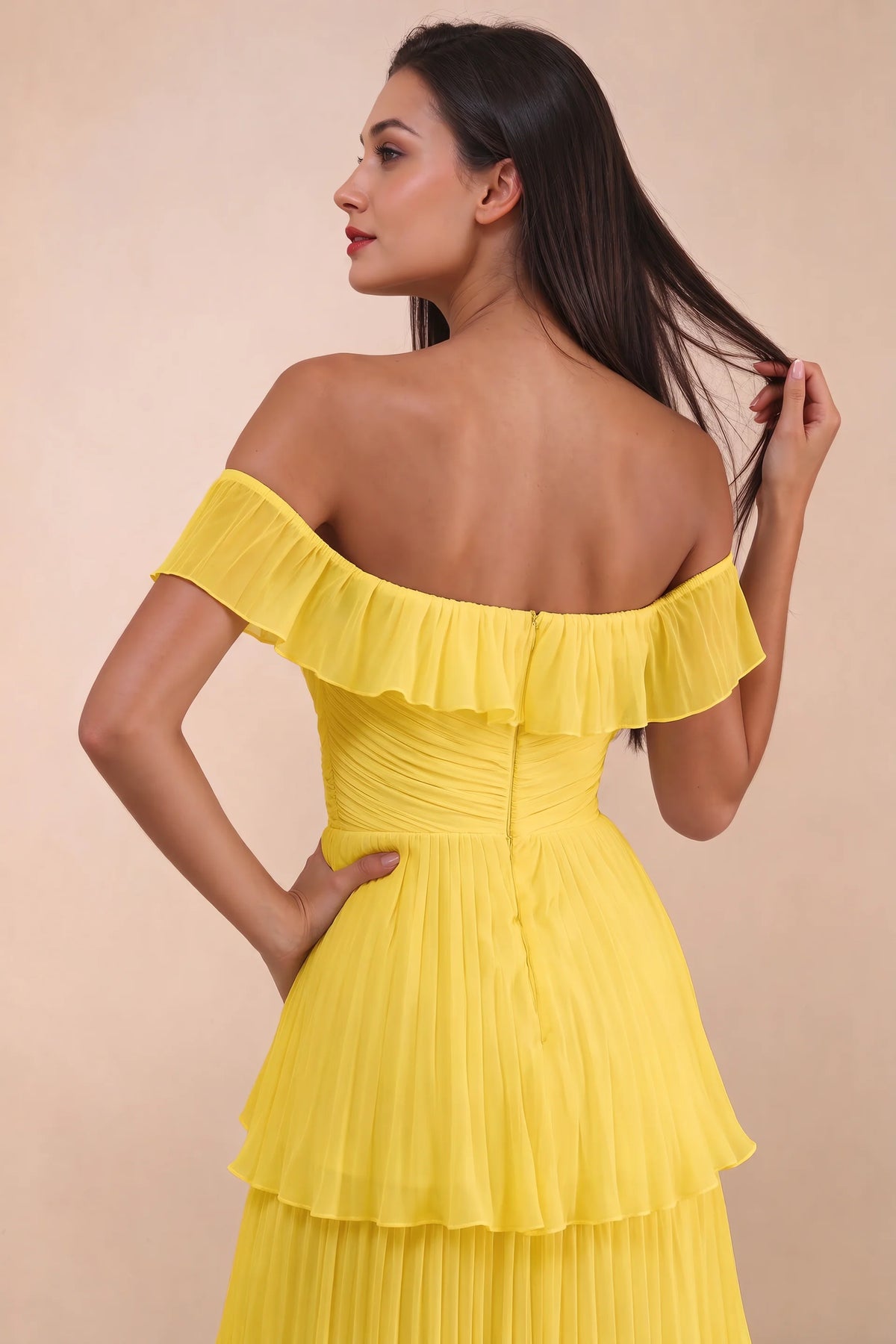 Close-up of back neckline ruffle, ruching and centre-back zipper of Seraphina yellow tiered ruffle maxi dress