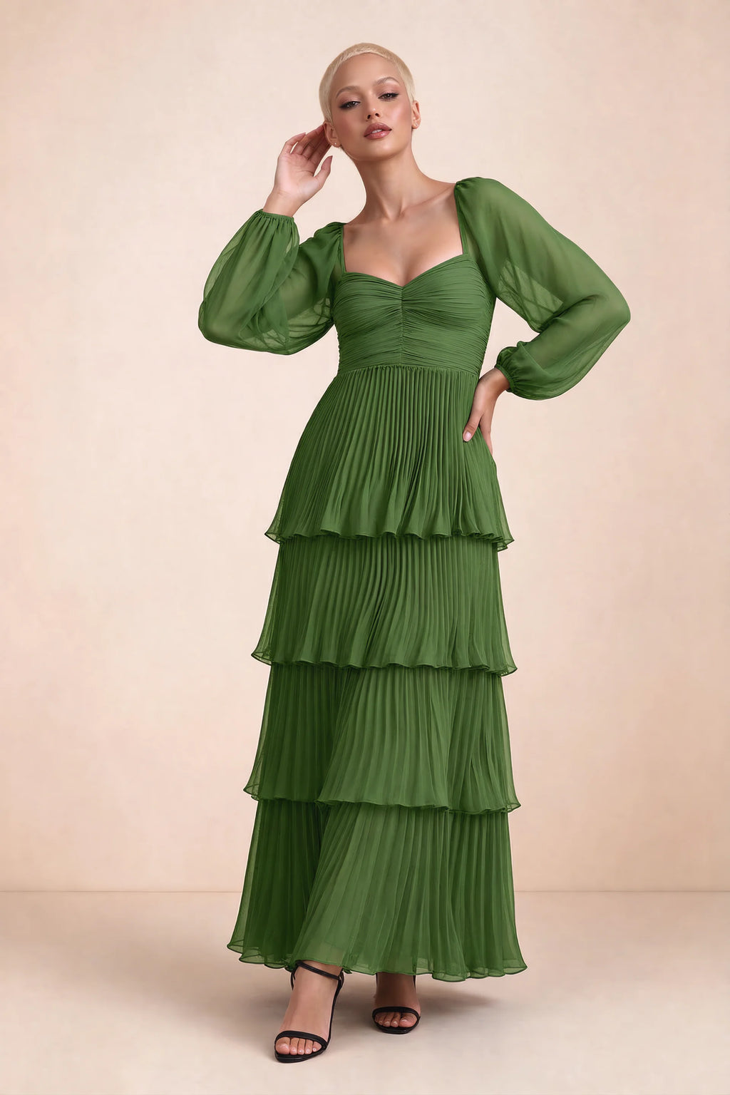 Front studio view of Sienna basil tiered pleated maxi dress with a long flowing skirt
