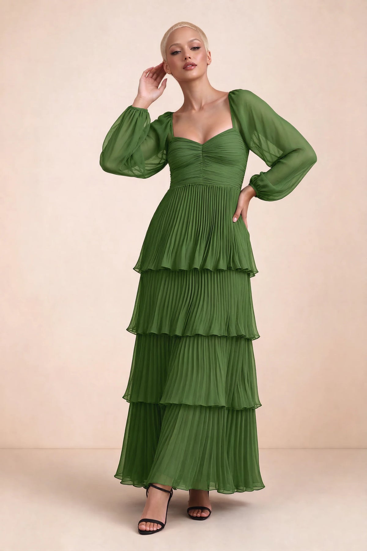 Front studio view of Sienna basil tiered pleated maxi dress with a long flowing skirt