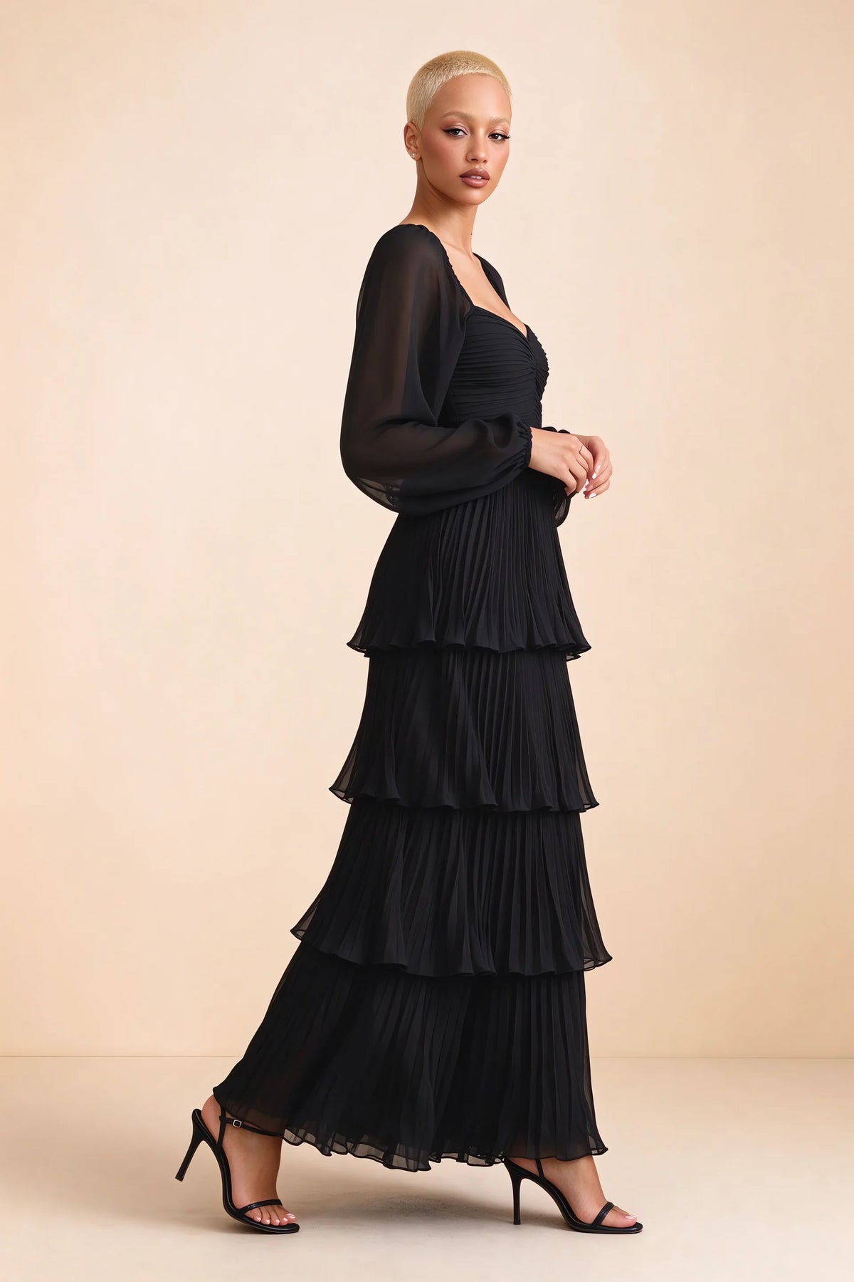 Alternate front studio view of Sienna black tiered pleated maxi dress with a long flowing skirt