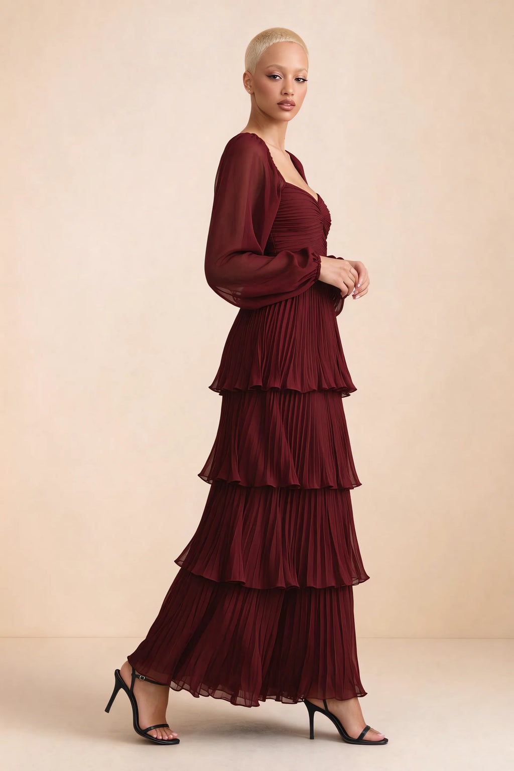 Alternate front studio view of Sienna burgundy tiered pleated maxi dress with a long flowing skirt