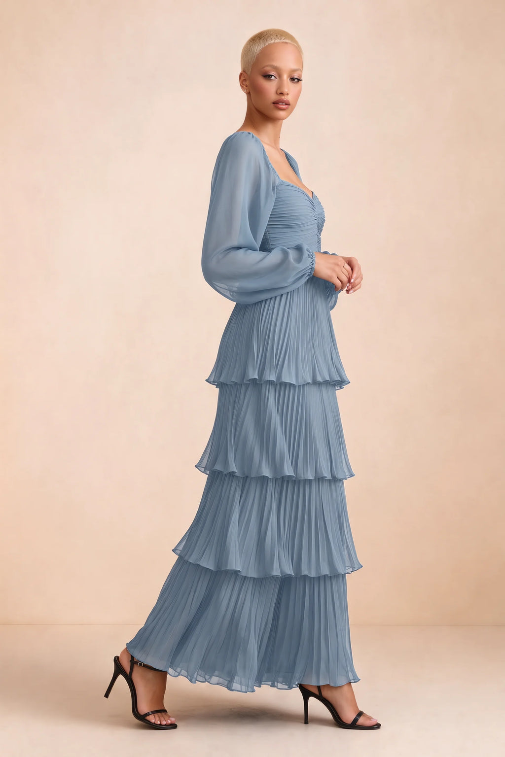 Alternate front studio view of Sienna dusty blue tiered pleated maxi dress with a long flowing skirt