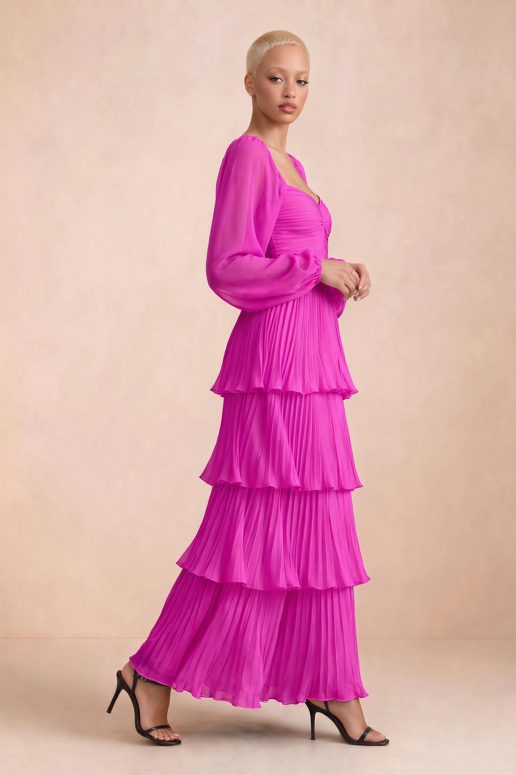 Alternate front studio view of Sienna fuchsia tiered pleated maxi dress with a long flowing skirt