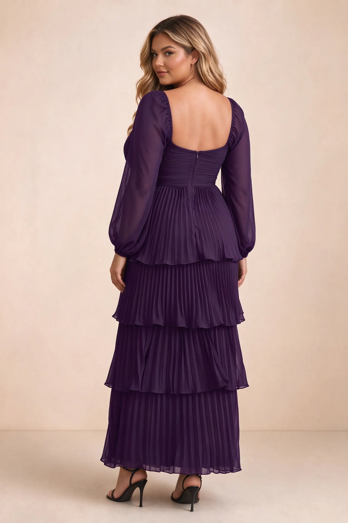 Rear view on a second model of Sienna grape tiered pleated maxi dress with a long flowing skirt