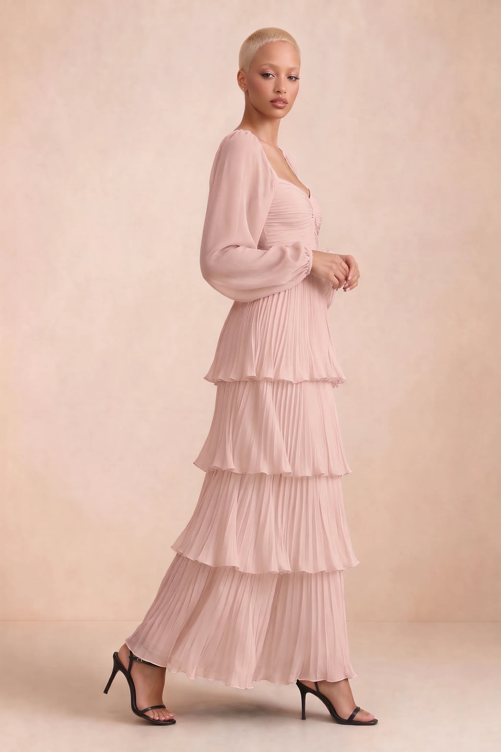 Alternate front studio view of Sienna haze pink tiered pleated maxi dress with a long flowing skirt