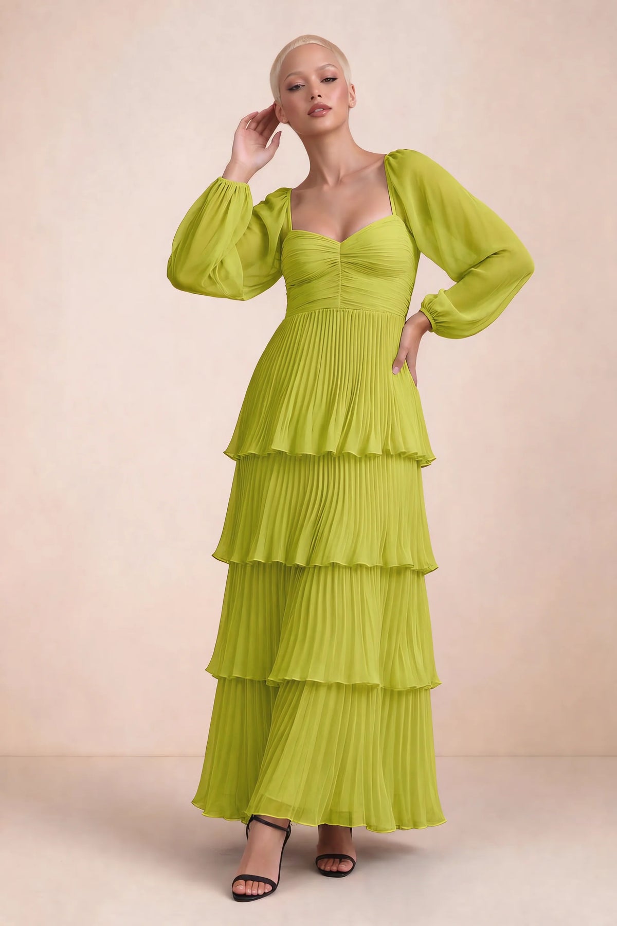 Front studio view of Sienna lemon green tiered pleated maxi dress with a long flowing skirt