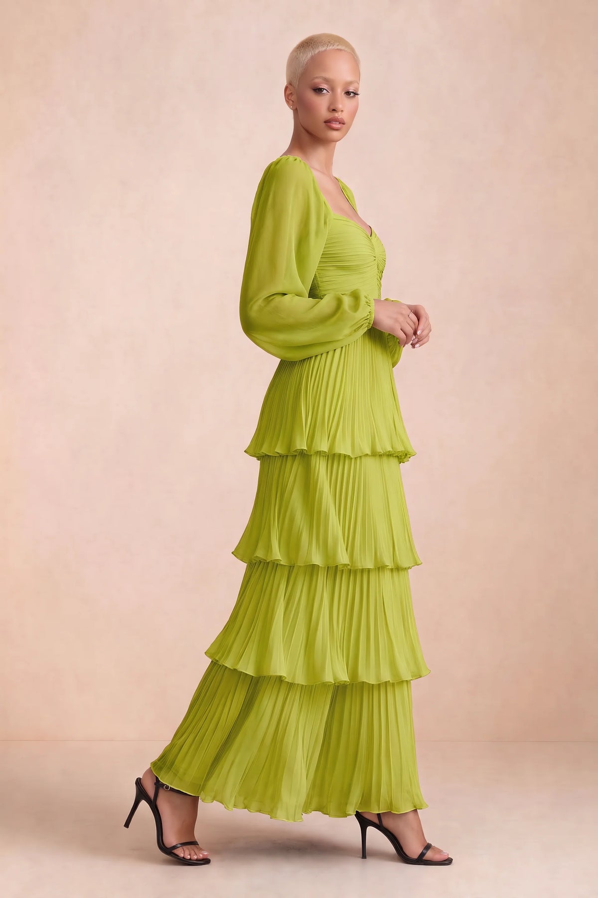 Alternate front studio view of Sienna lemon green tiered pleated maxi dress with a long flowing skirt