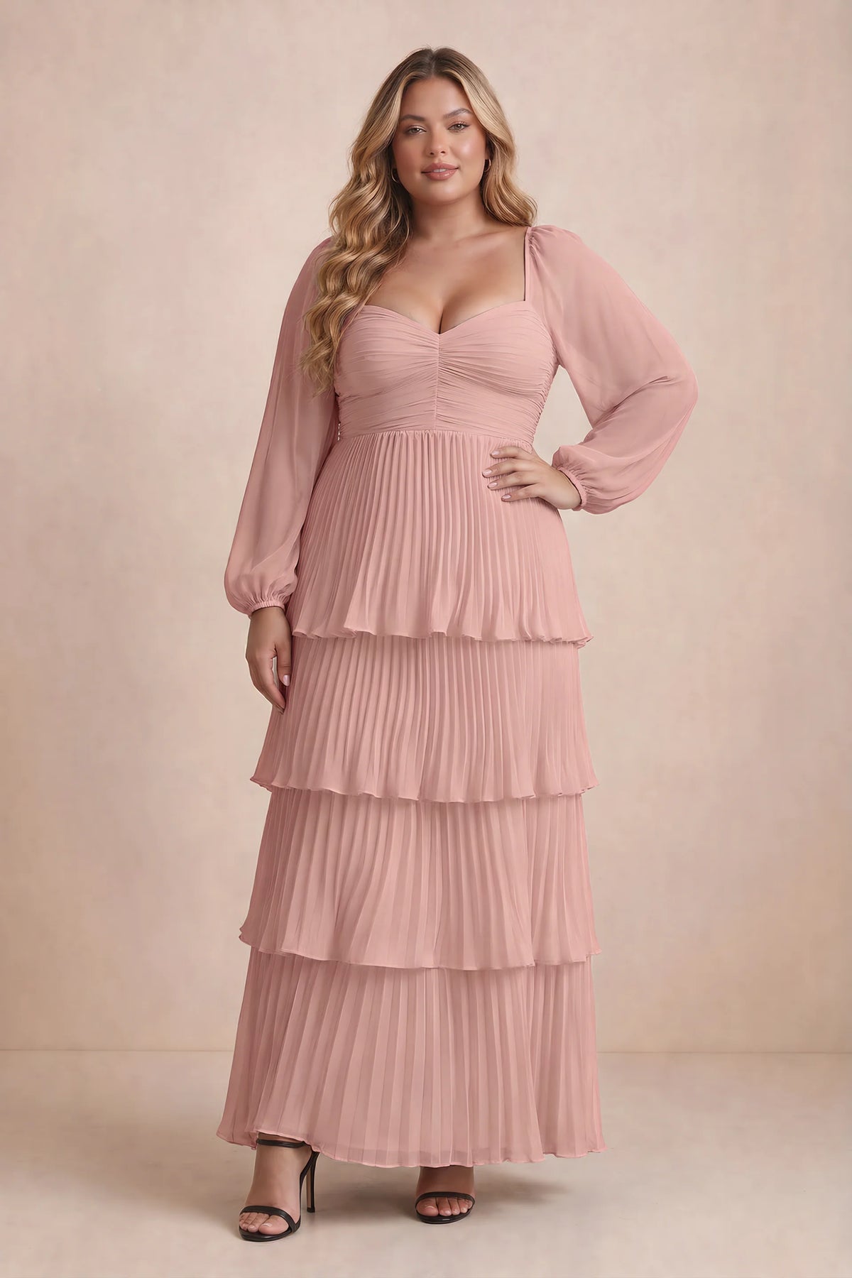 Front view on a second model of Sienna light pink tiered pleated maxi dress with a long flowing skirt
