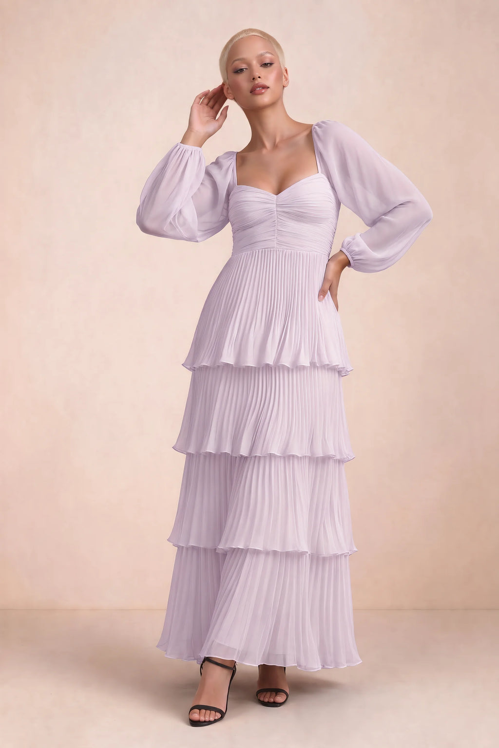 Front studio view of Sienna lilac tiered pleated maxi dress with a long flowing skirt