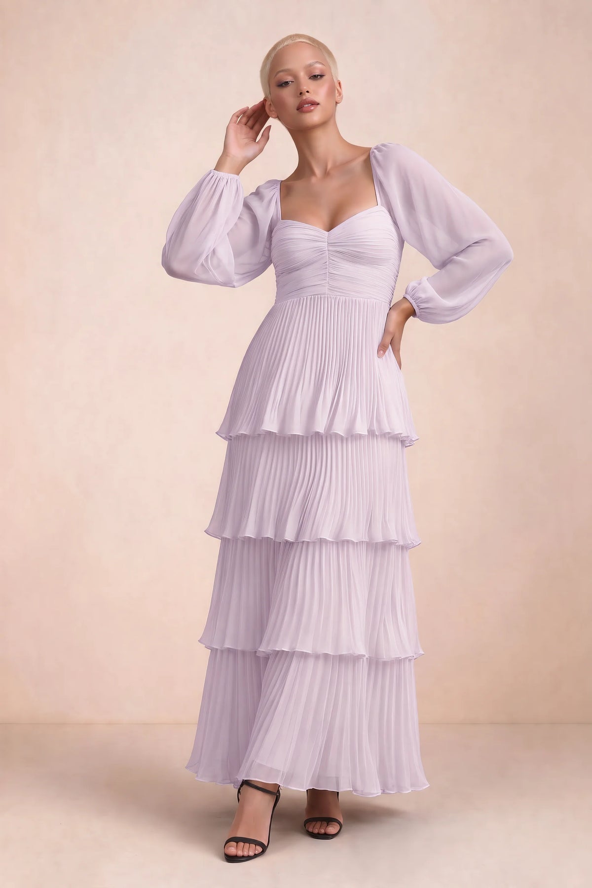 Front studio view of Sienna lilac tiered pleated maxi dress with a long flowing skirt