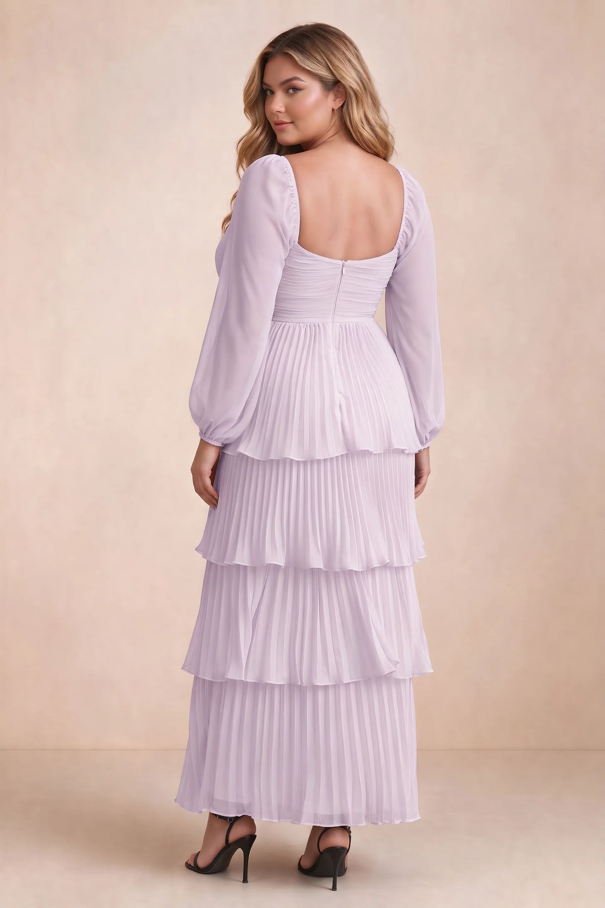 Rear view on a second model of Sienna lilac tiered pleated maxi dress with a long flowing skirt