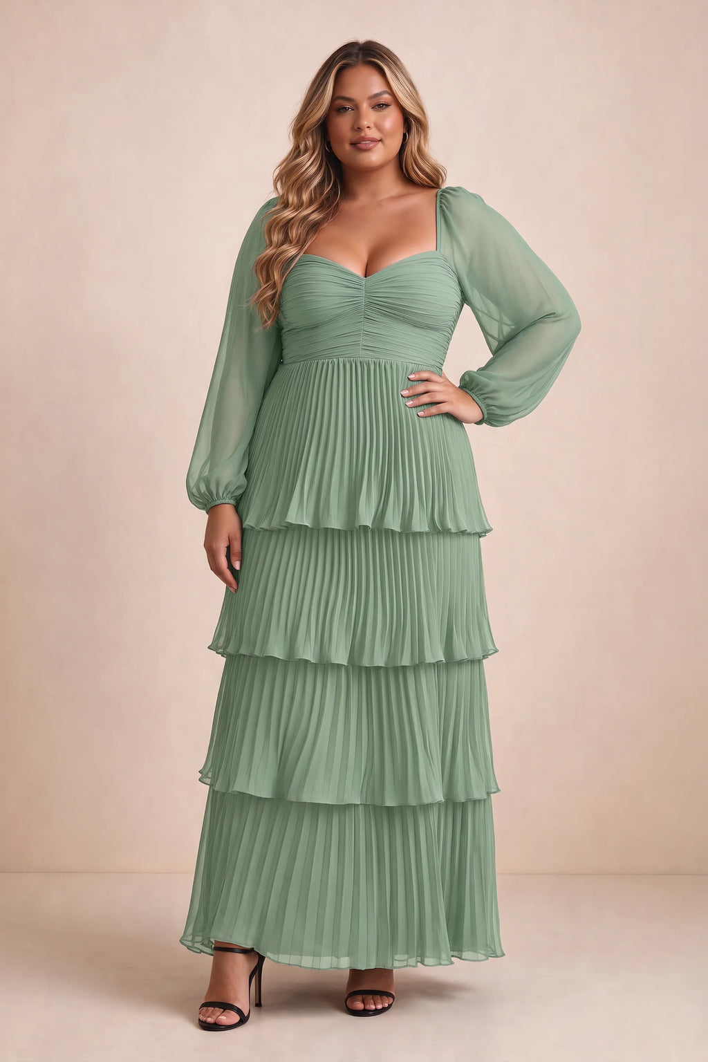 Front view on a second model of Sienna matcha green tiered pleated maxi dress with a long flowing skirt