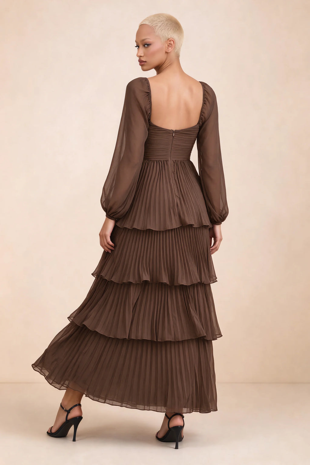 Rear studio view of Sienna mocha tiered pleated maxi dress with a long flowing skirt