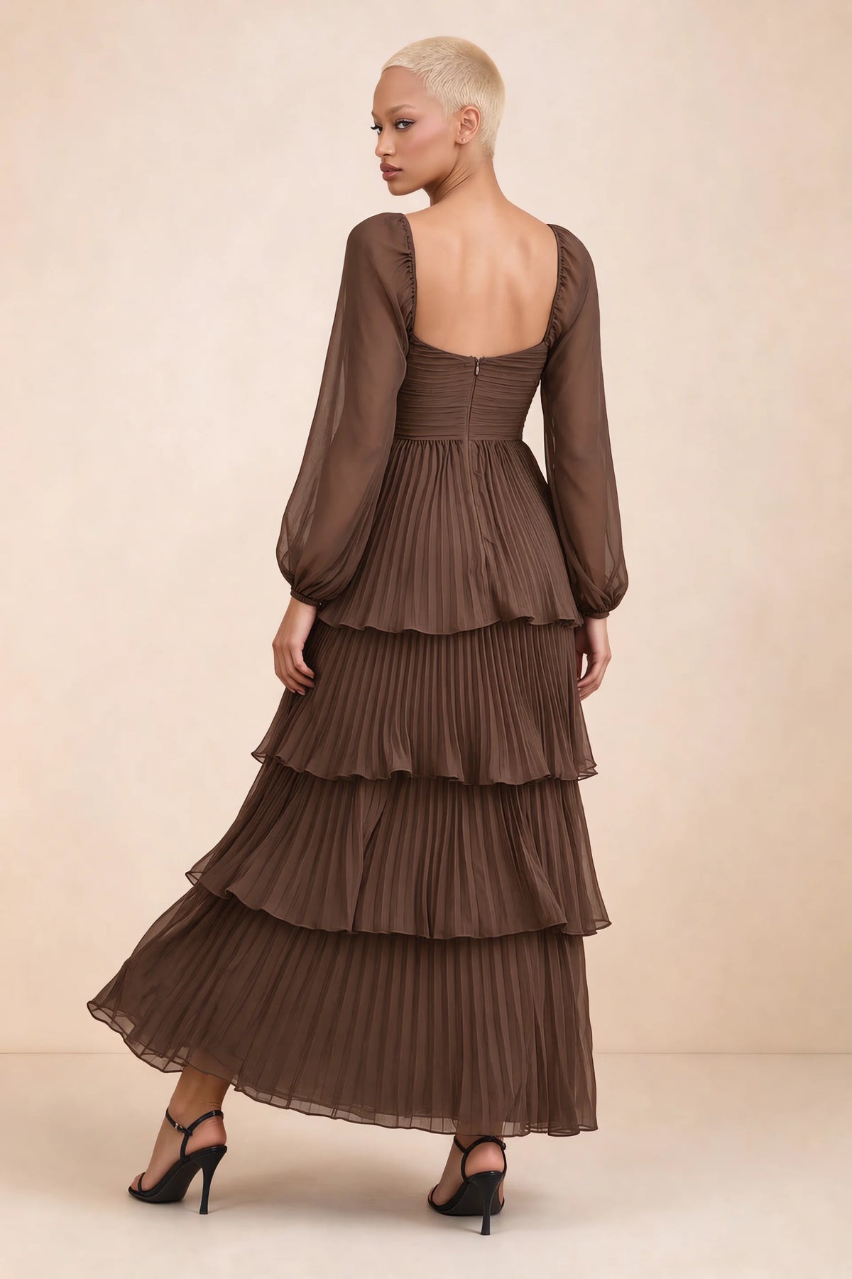 Rear studio view of Sienna mocha tiered pleated maxi dress with a long flowing skirt