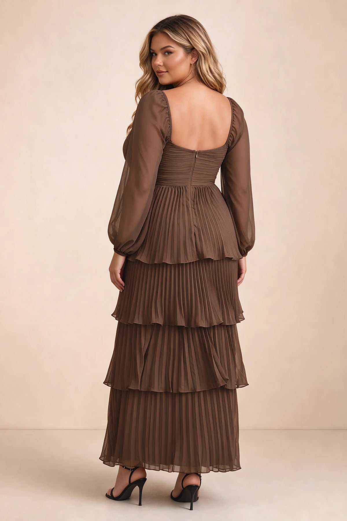 Rear view on a second model of Sienna mocha tiered pleated maxi dress with a long flowing skirt