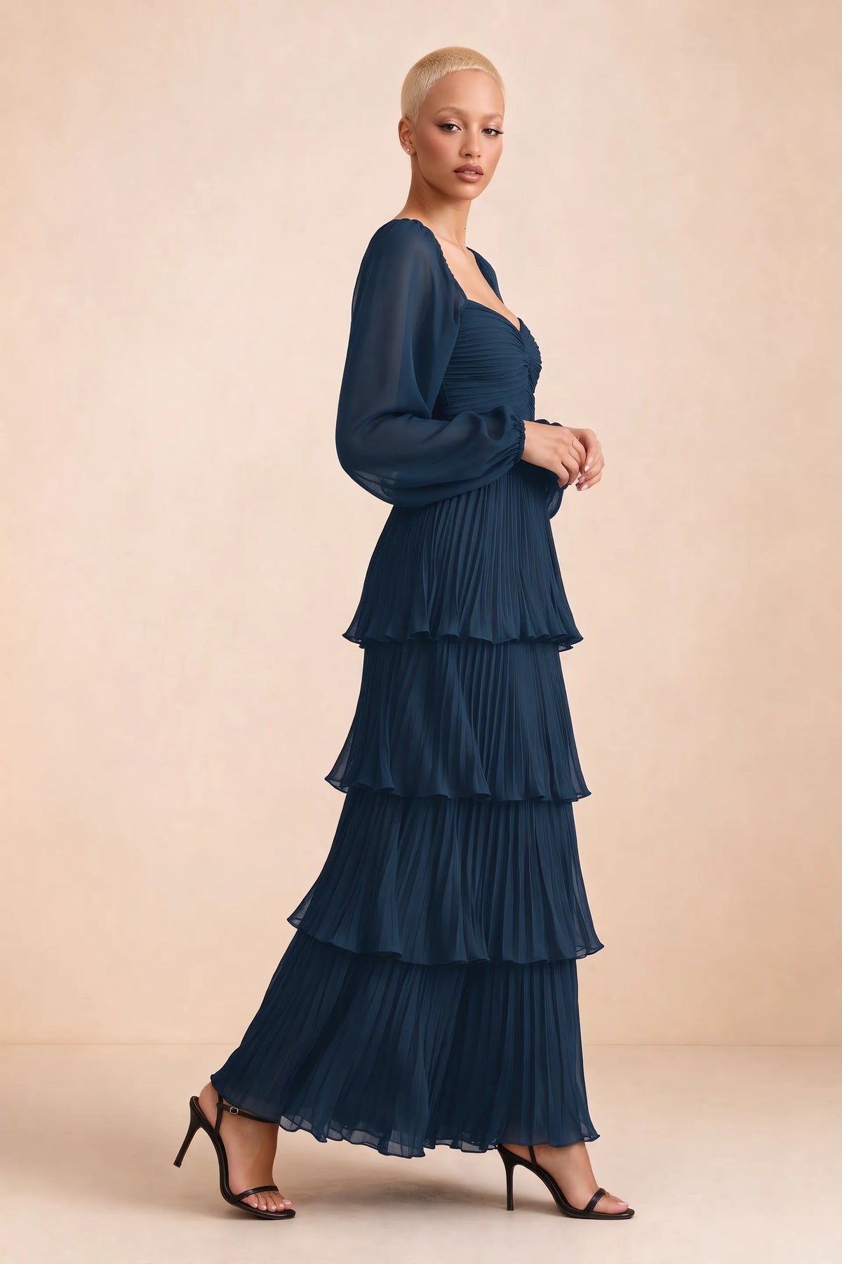 Alternate front studio view of Sienna navy tiered pleated maxi dress with a long flowing skirt
