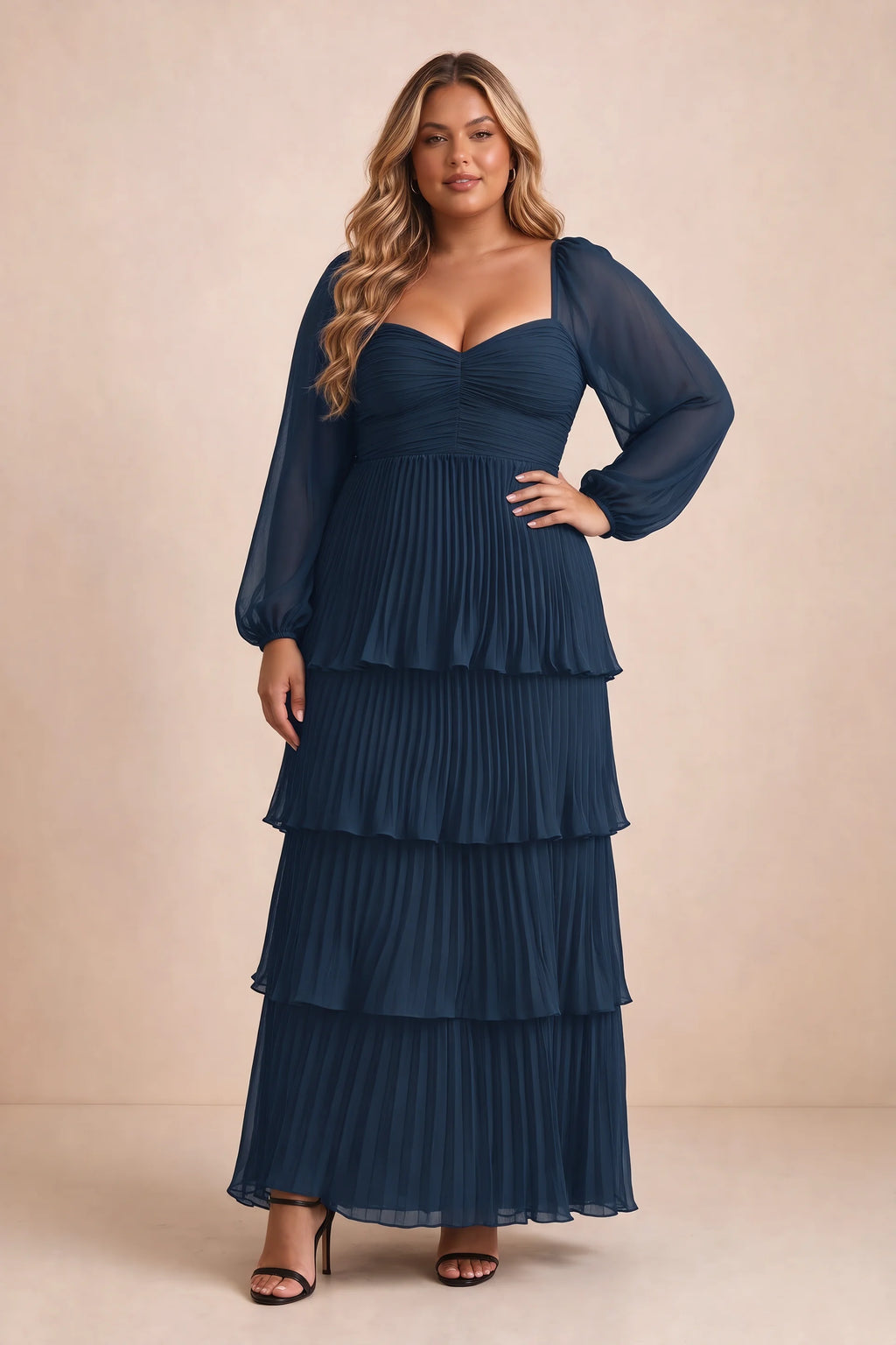 Front view on a second model of Sienna navy tiered pleated maxi dress with a long flowing skirt