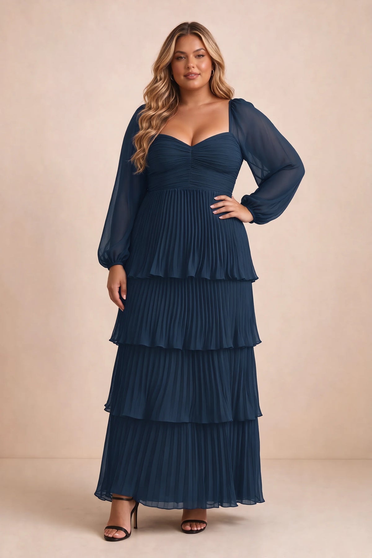 Front view on a second model of Sienna navy tiered pleated maxi dress with a long flowing skirt