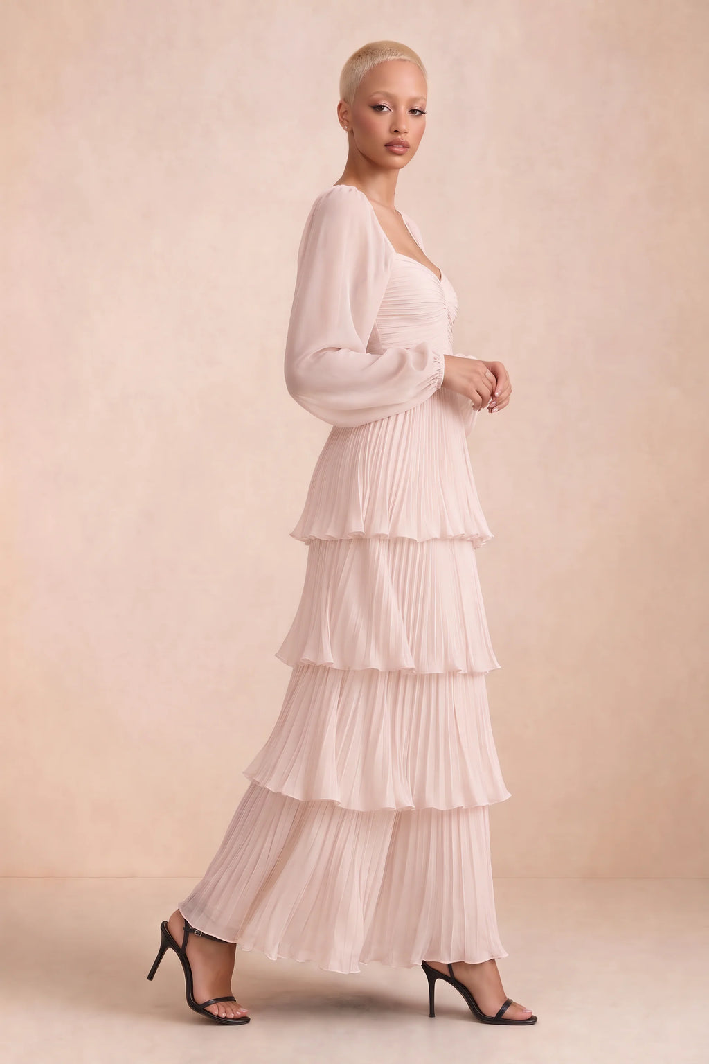 Alternate front studio view of Sienna powder pink tiered pleated maxi dress with a long flowing skirt
