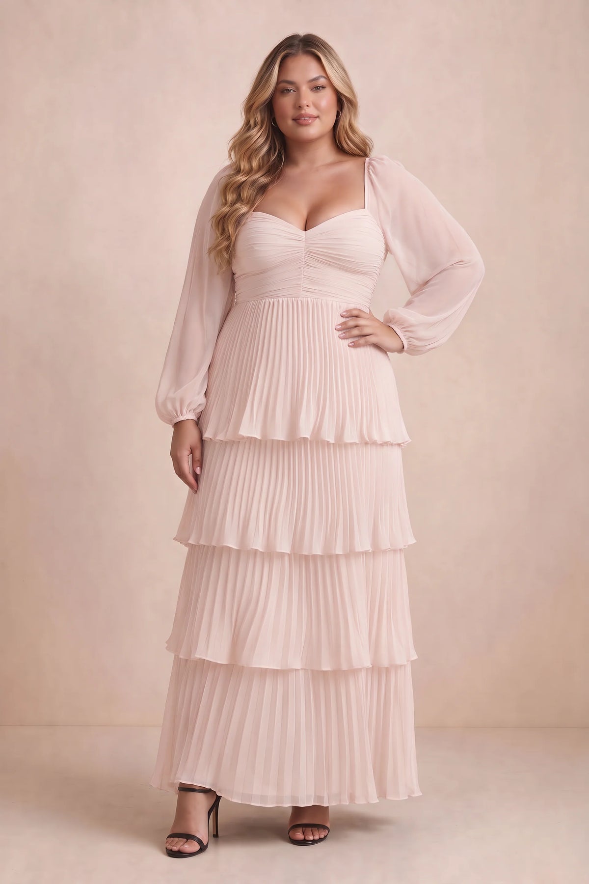 Front view on a second model of Sienna powder pink tiered pleated maxi dress with a long flowing skirt