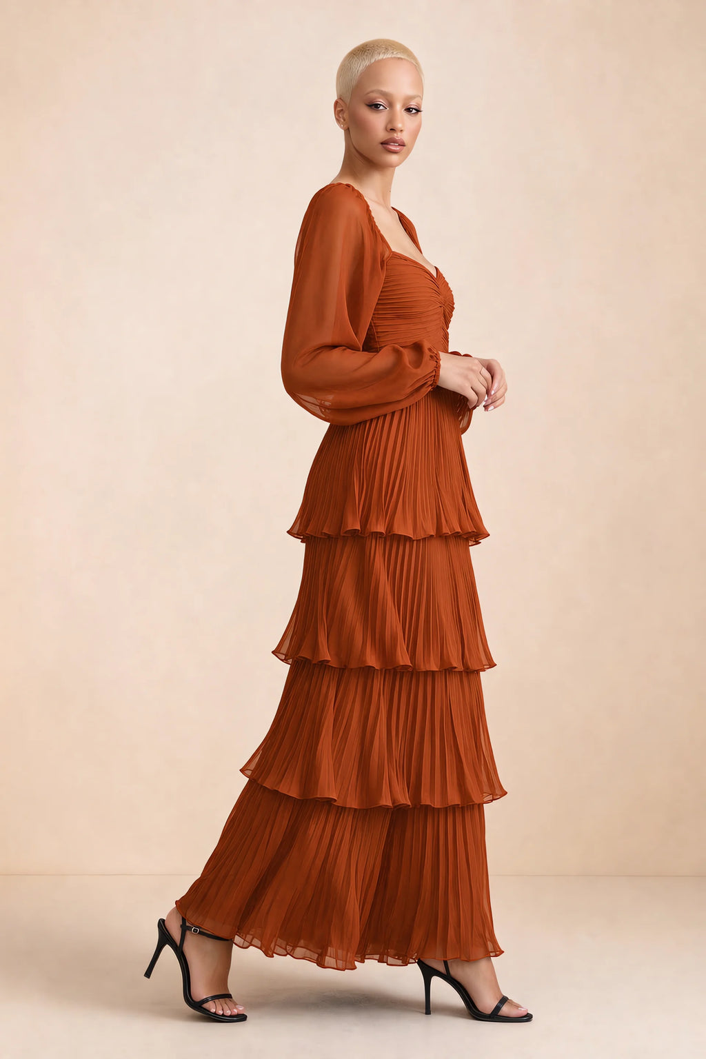 Alternate front studio view of Sienna rust tiered pleated maxi dress with a long flowing skirt