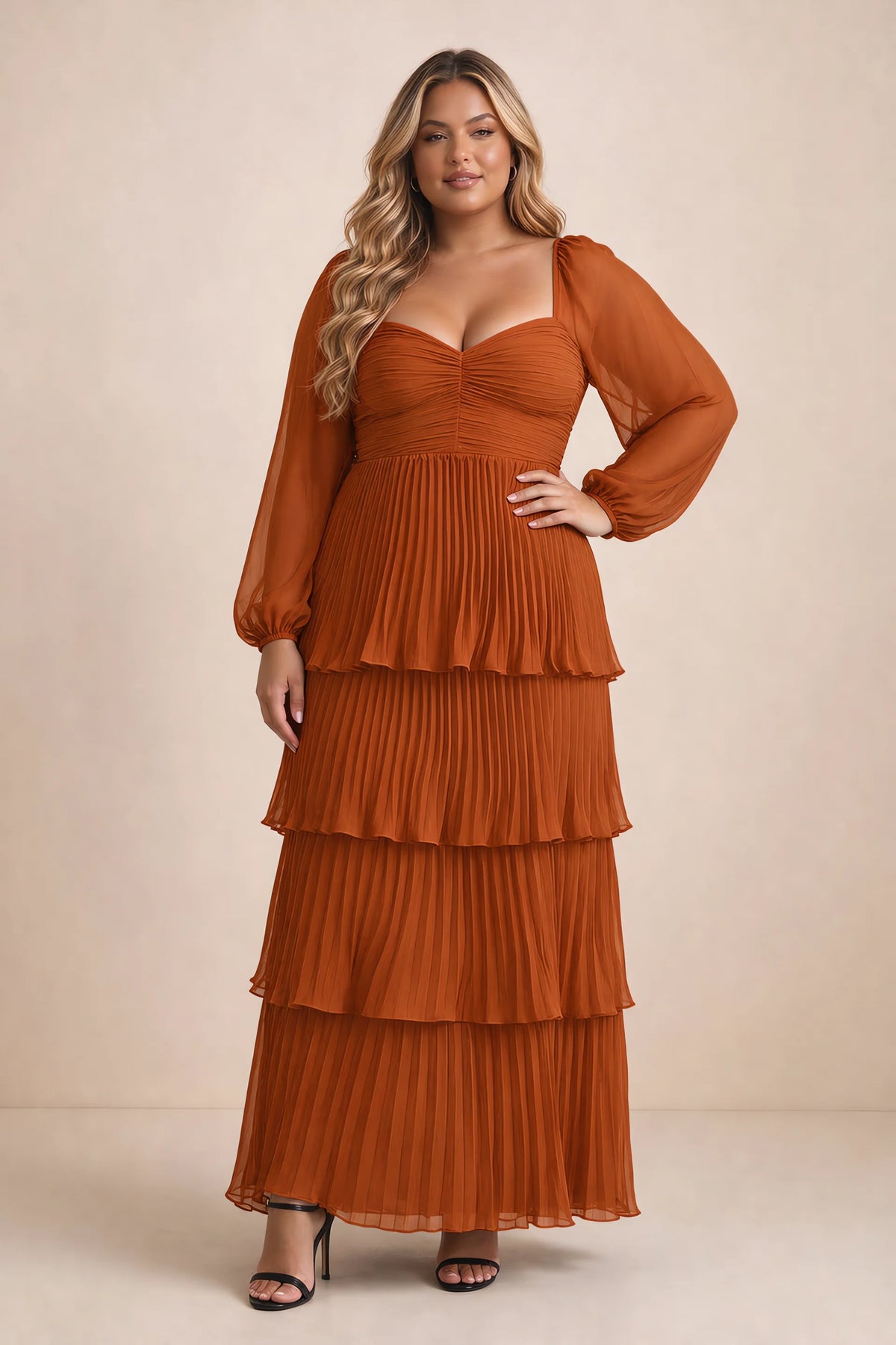 Front view on a second model of Sienna rust tiered pleated maxi dress with a long flowing skirt