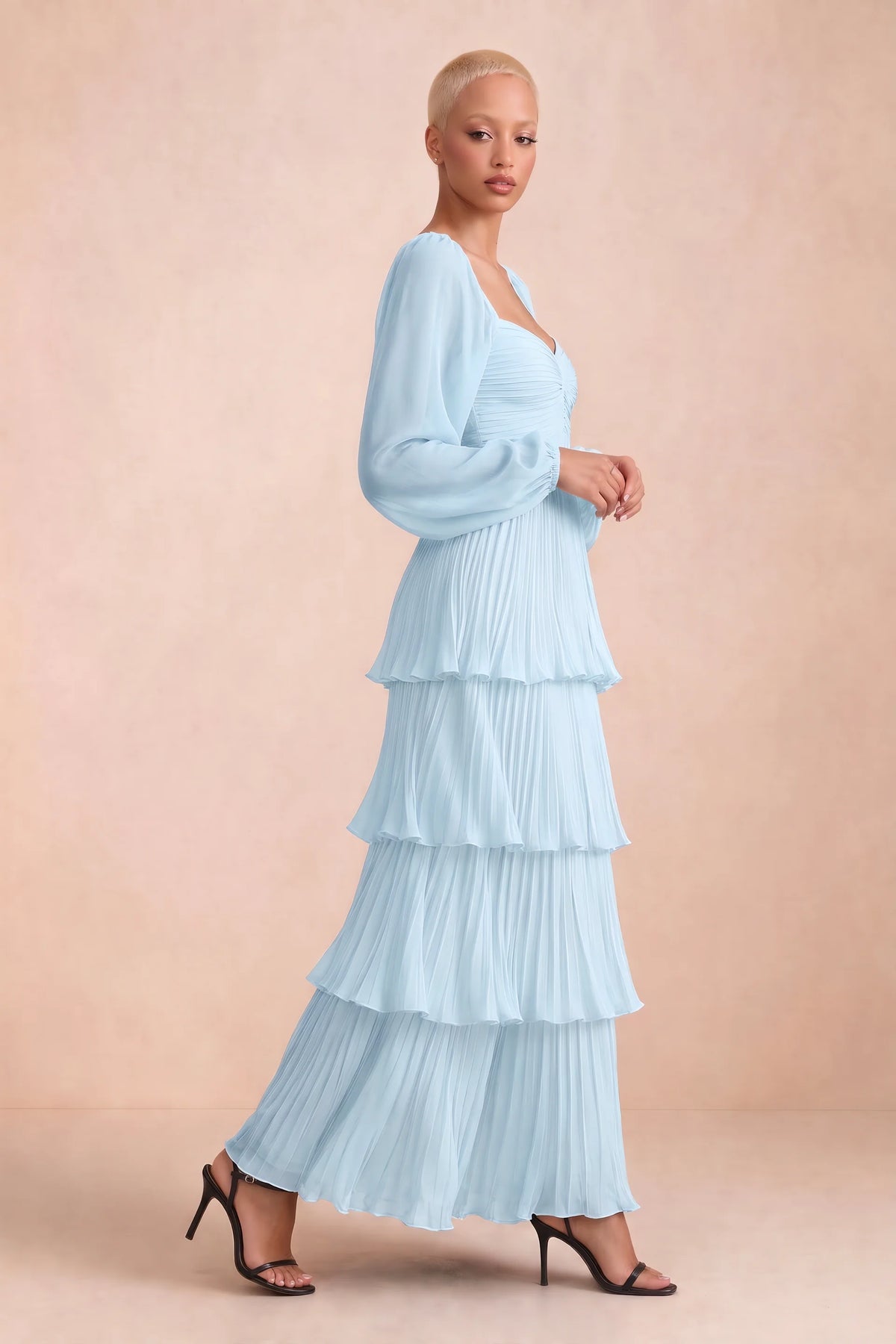 Alternate front studio view of Sienna sky blue tiered pleated maxi dress with a long flowing skirt