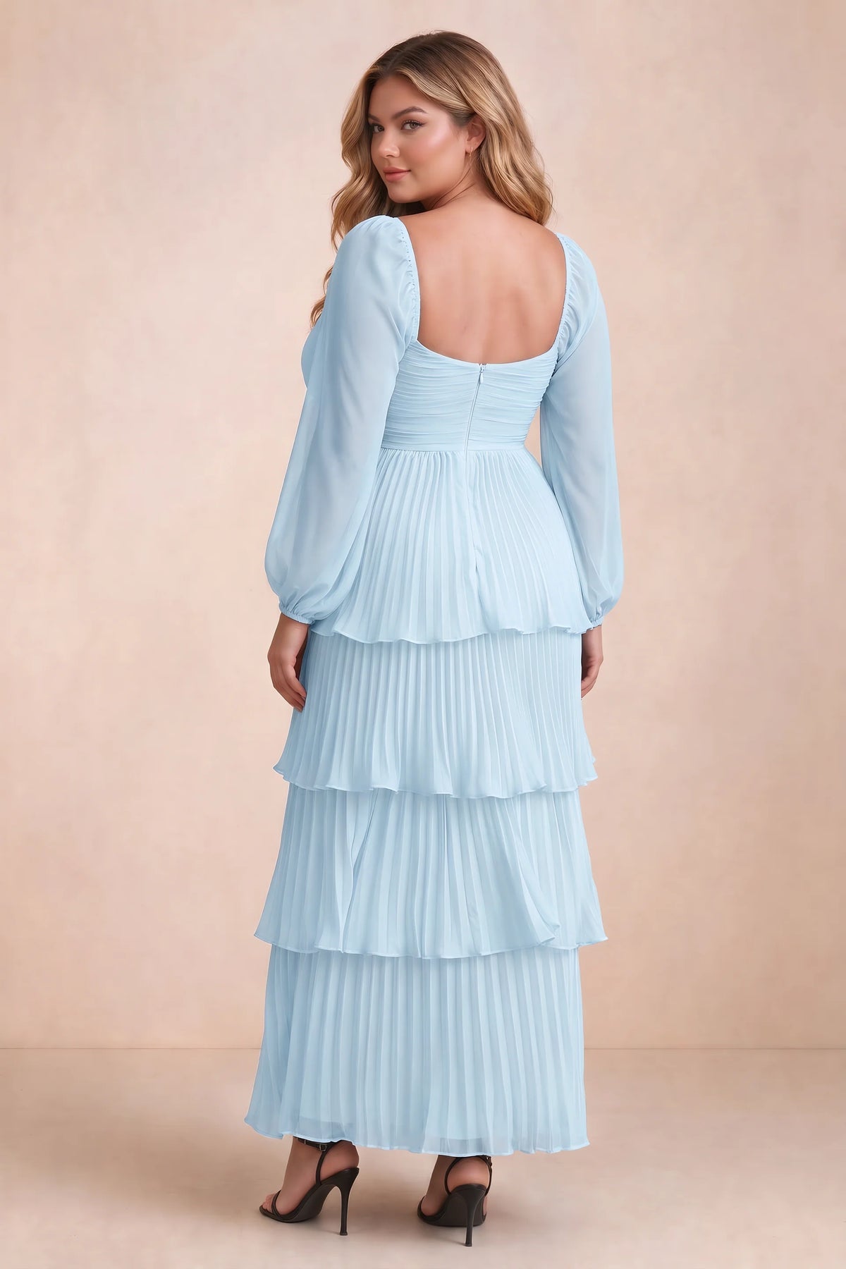 Rear view on a second model of Sienna sky blue tiered pleated maxi dress with a long flowing skirt