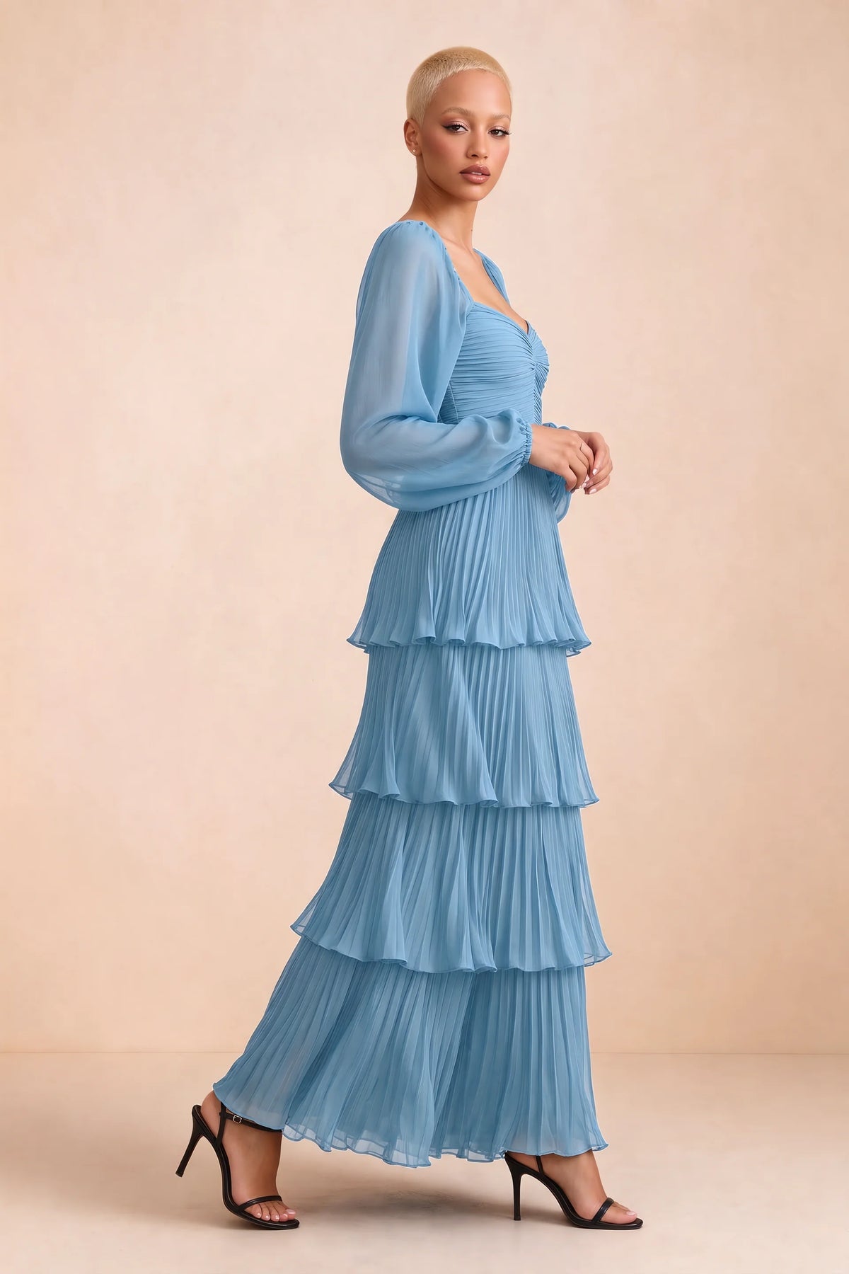 Alternate front studio view of Sienna steel blue tiered pleated maxi dress with a long flowing skirt
