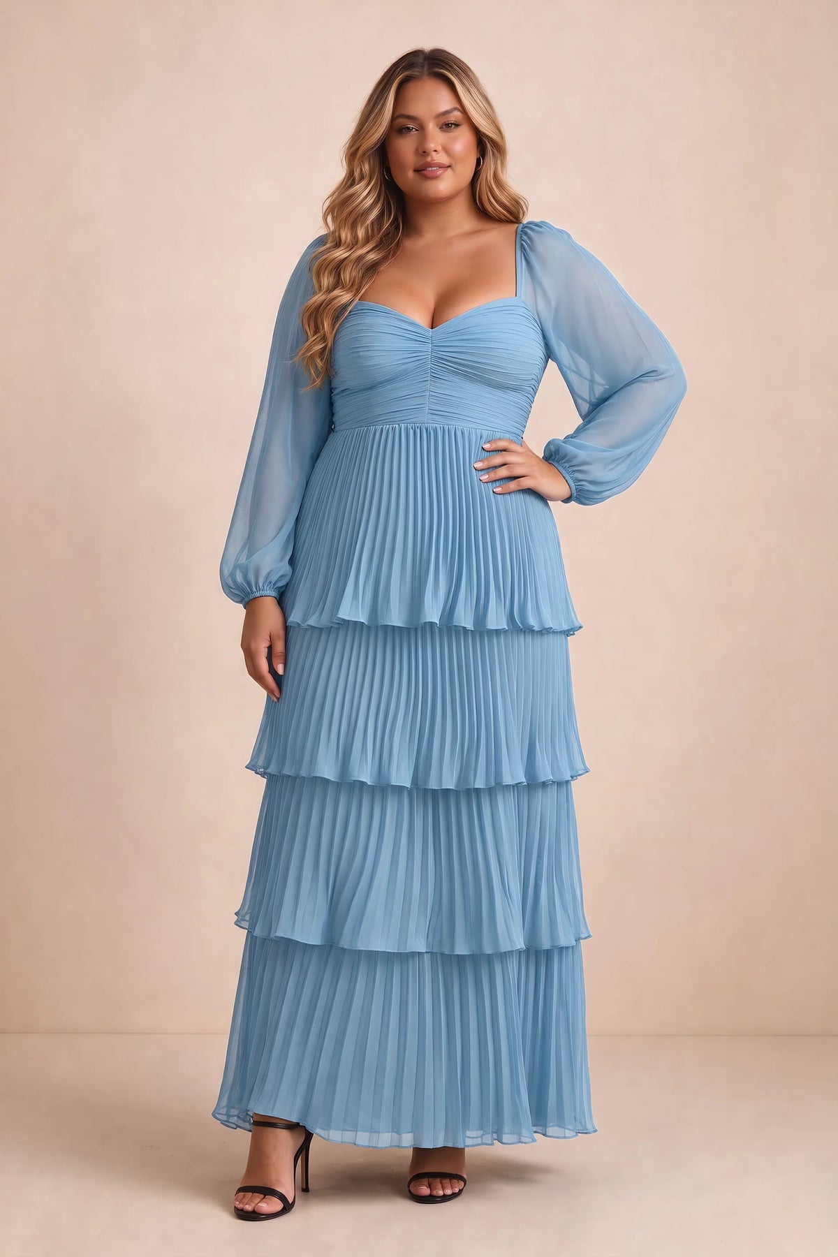 Front view on a second model of Sienna steel blue tiered pleated maxi dress with a long flowing skirt