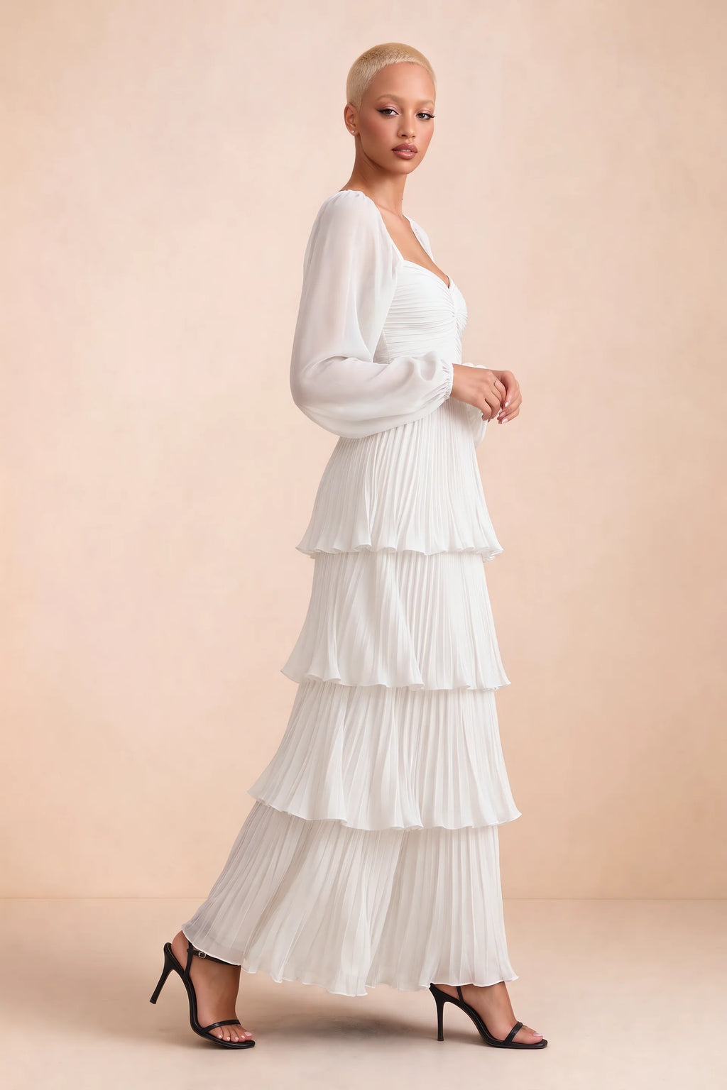 Alternate front studio view of Sienna white tiered pleated maxi dress with a long flowing skirt
