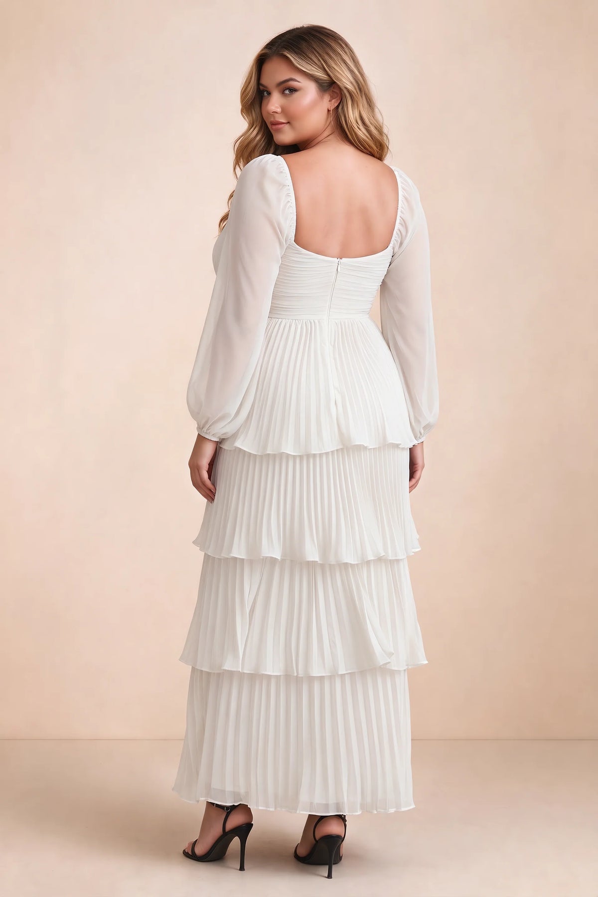 Rear view on a second model of Sienna white tiered pleated maxi dress with a long flowing skirt