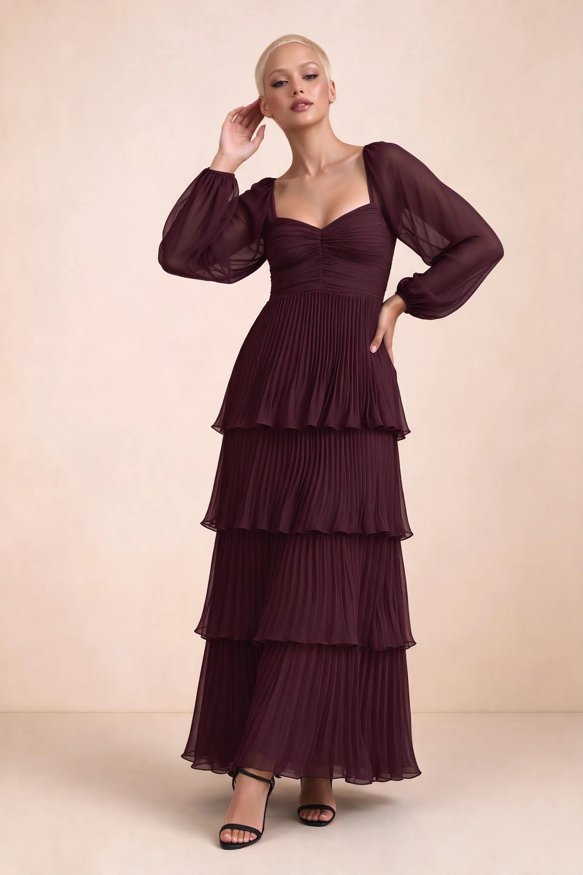 Front studio view of Sienna wine tiered pleated maxi dress with a long flowing skirt